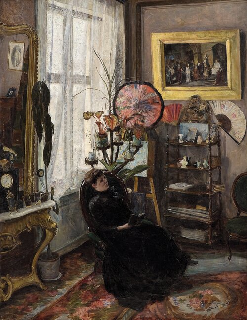 Interiør med sittende kvinne 1887