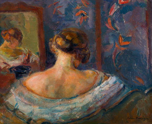 Kvinne ved speilet