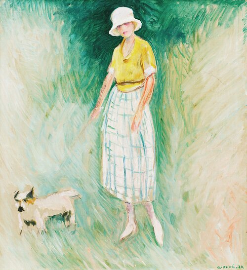 Kvinne med skjødehund i bånd 1920