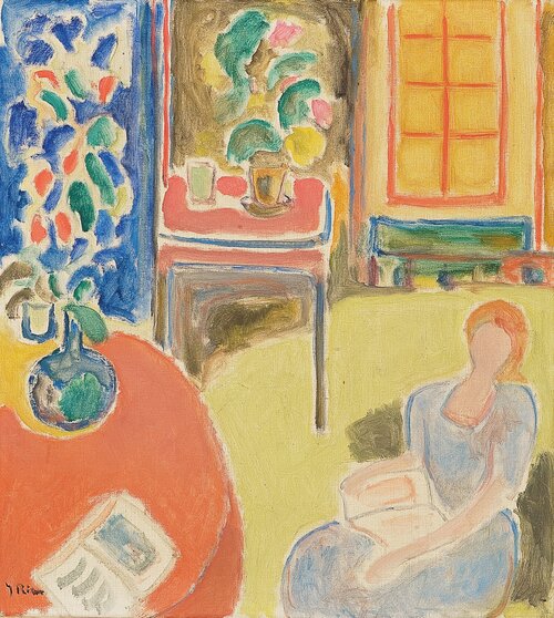 Seated woman in an interior