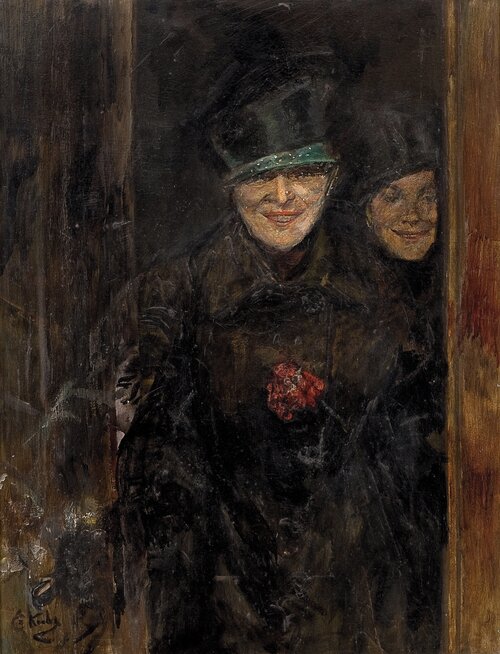 Two women by an open door