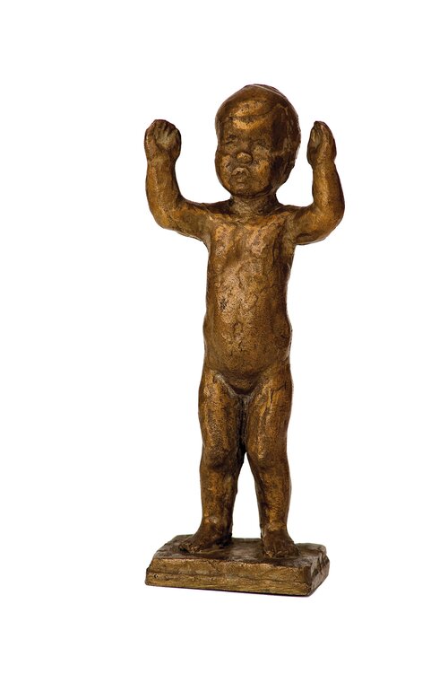 Little child with arms raised